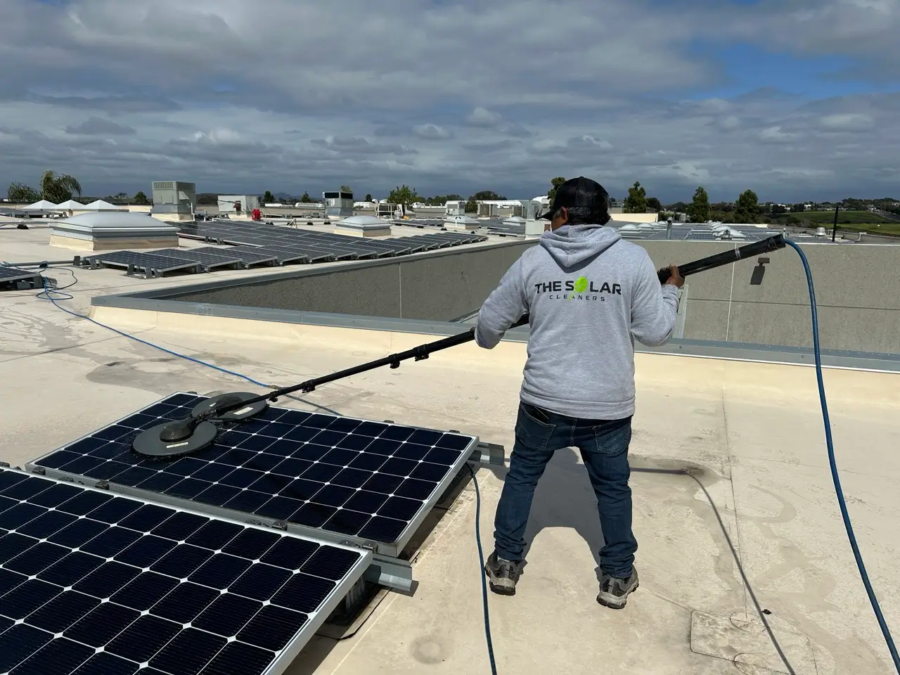 Solar panel cleaner performing professional solar panel cleaning in San Diego