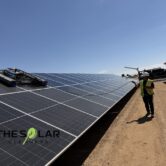 Utility scale solar cleaning with professional solar panel cleaning equipment on a large ground mounted solar array