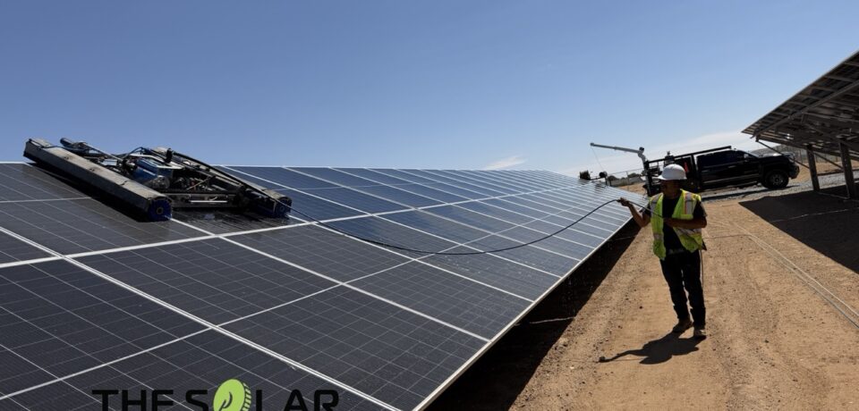 Utility scale solar cleaning with professional solar panel cleaning equipment on a large ground mounted solar array